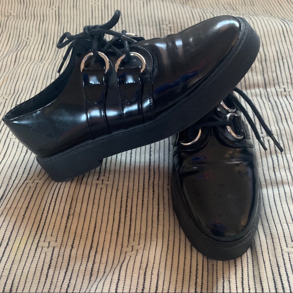 Black faux leather creepers
